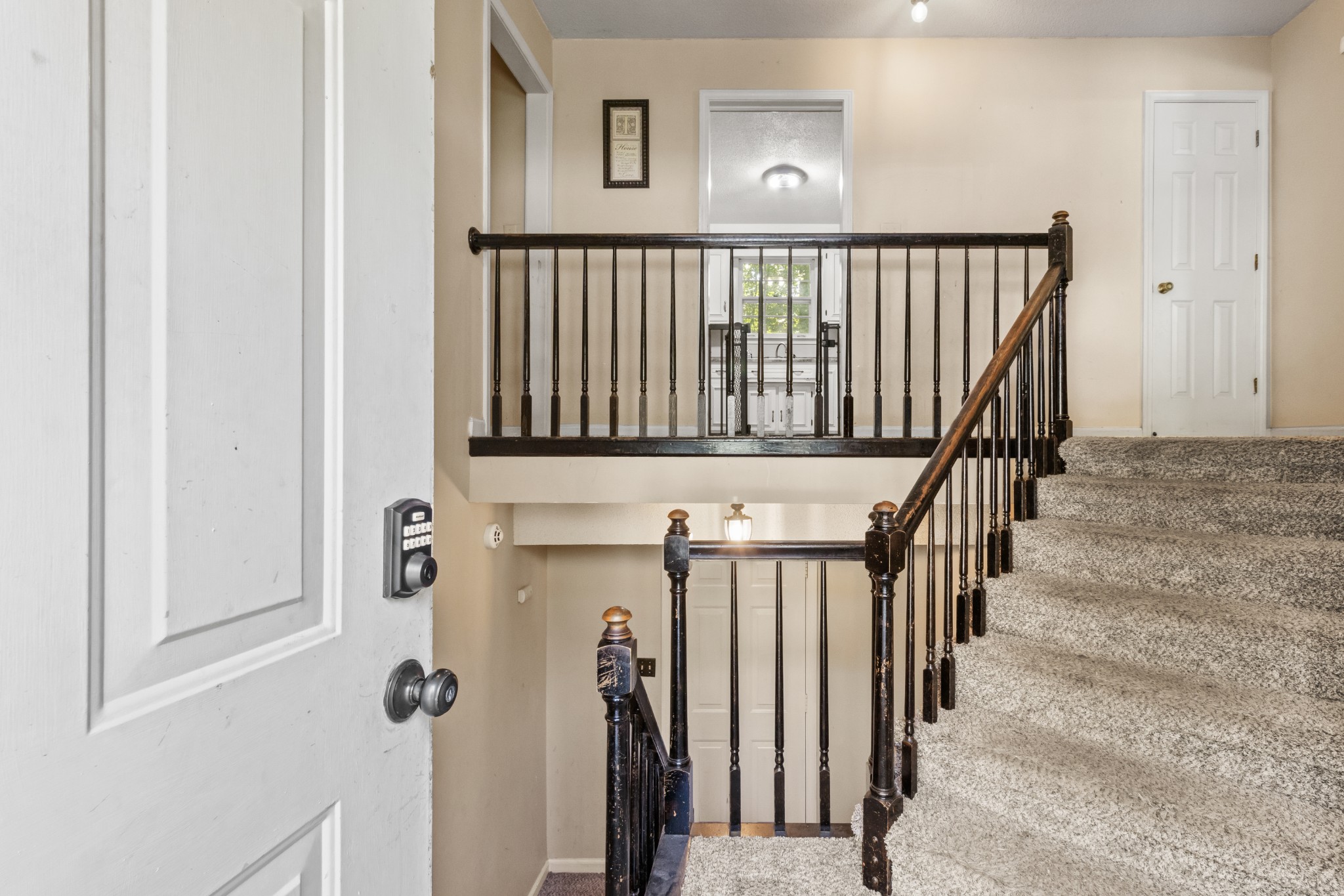 206 Pine Mountain Road Clarksville, TN 37042 - Photo 4 of 17 a view of a hallway with wooden floor and staircase
