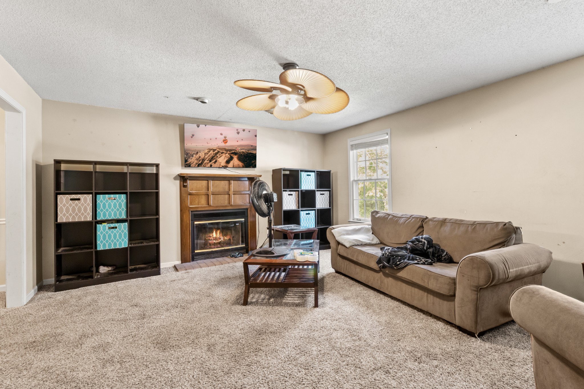 206 Pine Mountain Road Clarksville, TN 37042 - Photo 8 of 17 a living room with furniture and a flat screen tv
