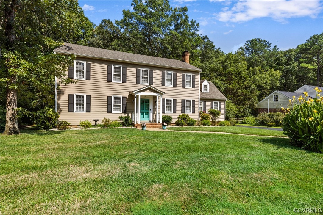 1513 Willingham Road Henrico, VA 23238 - Photo 1 of 40 a front view of a house with a yard table and chairs