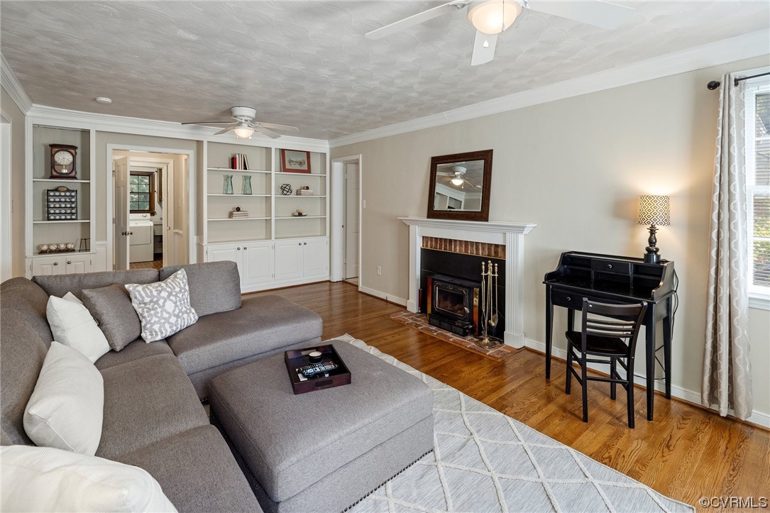 1513 Willingham Road Henrico, VA 23238 - Photo 17 of 40 a living room with furniture and a fireplace