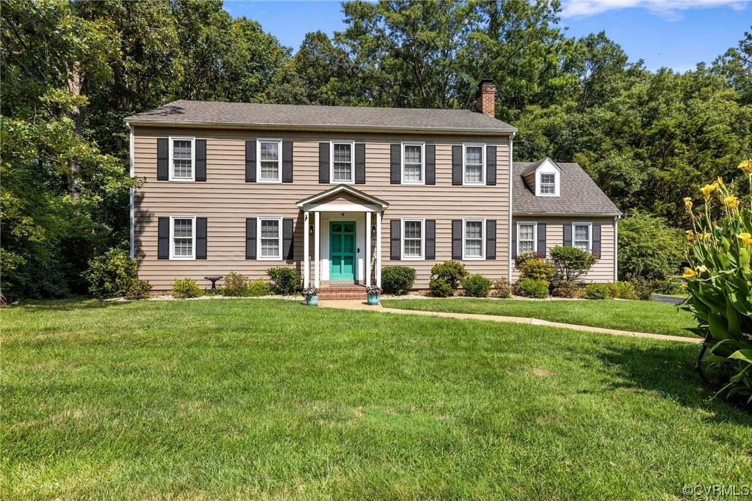 1513 Willingham Road Henrico, VA 23238 - Photo 2 of 40 a front view of a house with a yard and trees