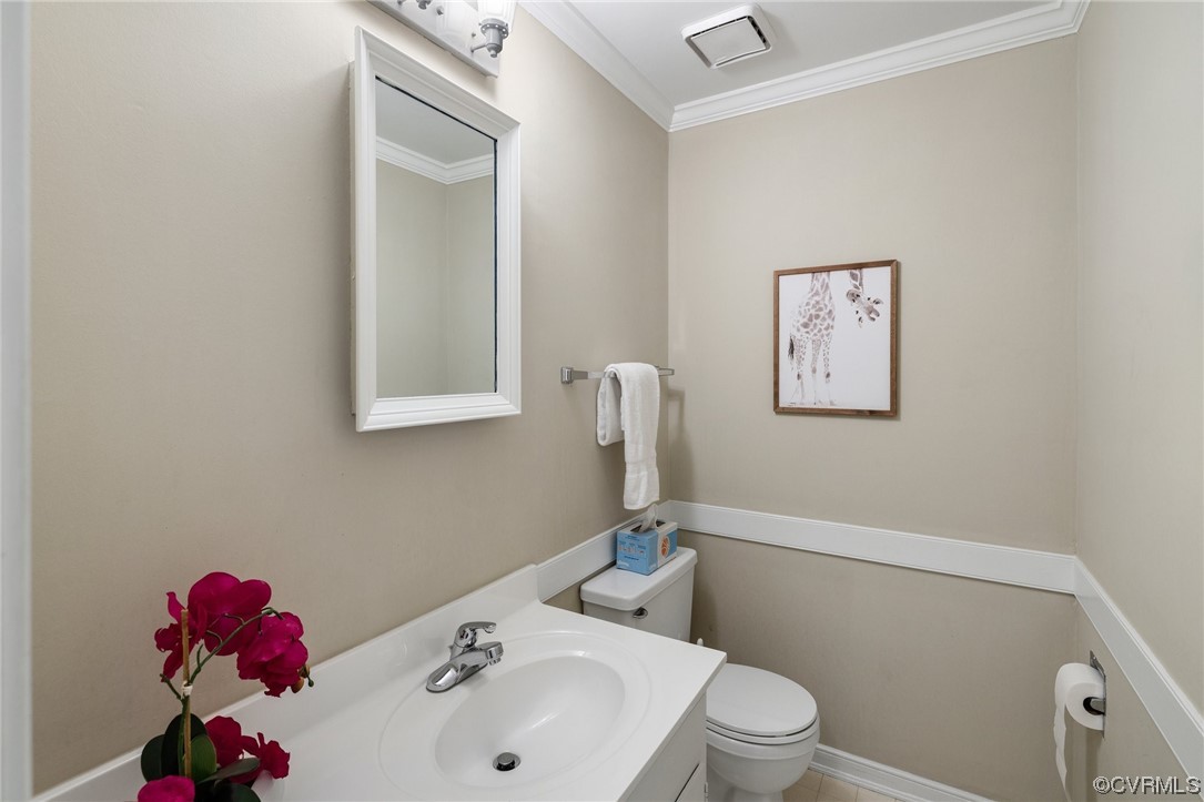 1513 Willingham Road Henrico, VA 23238 - Photo 25 of 40 a bathroom with a sink mirror and toilet