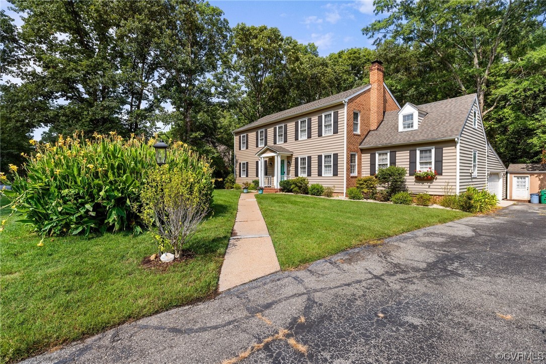 1513 Willingham Road Henrico, VA 23238 - Photo 3 of 40 a view of yard in front of house with trees