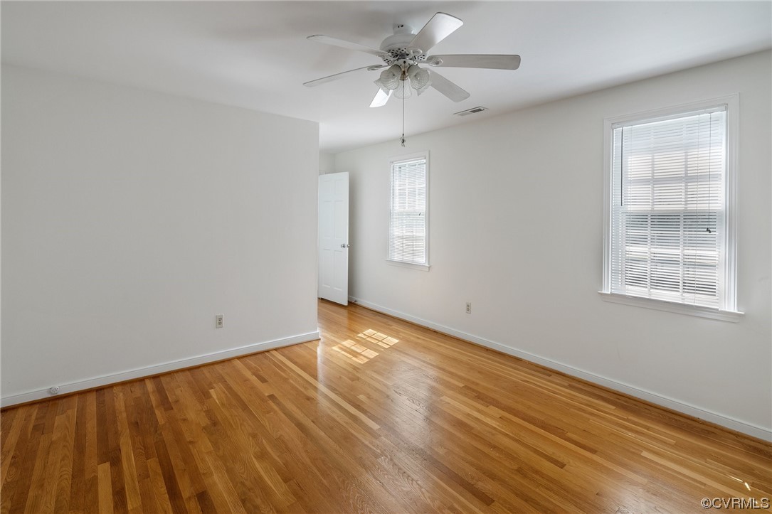 1513 Willingham Road Henrico, VA 23238 - Photo 36 of 40 a view of an empty room with window and wooden floor