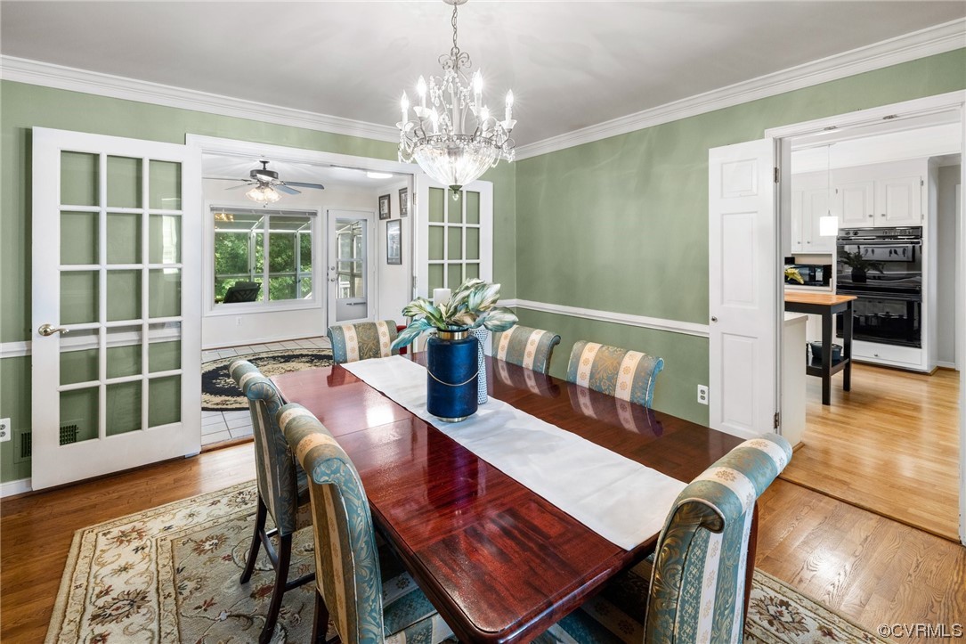 1513 Willingham Road Henrico, VA 23238 - Photo 9 of 40 a view of a dining room with furniture window and wooden floor
