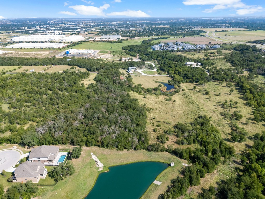 333 County Road 166 Georgetown, TX 78626 - Photo 27 of 36 an aerial view of residential houses with outdoor space and trees