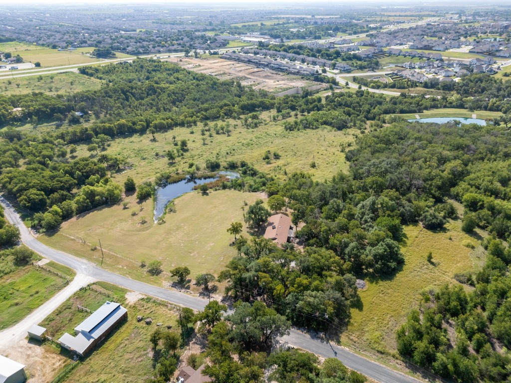 333 County Road 166 Georgetown, TX 78626 - Photo 34 of 36 an aerial view of residential houses with outdoor space
