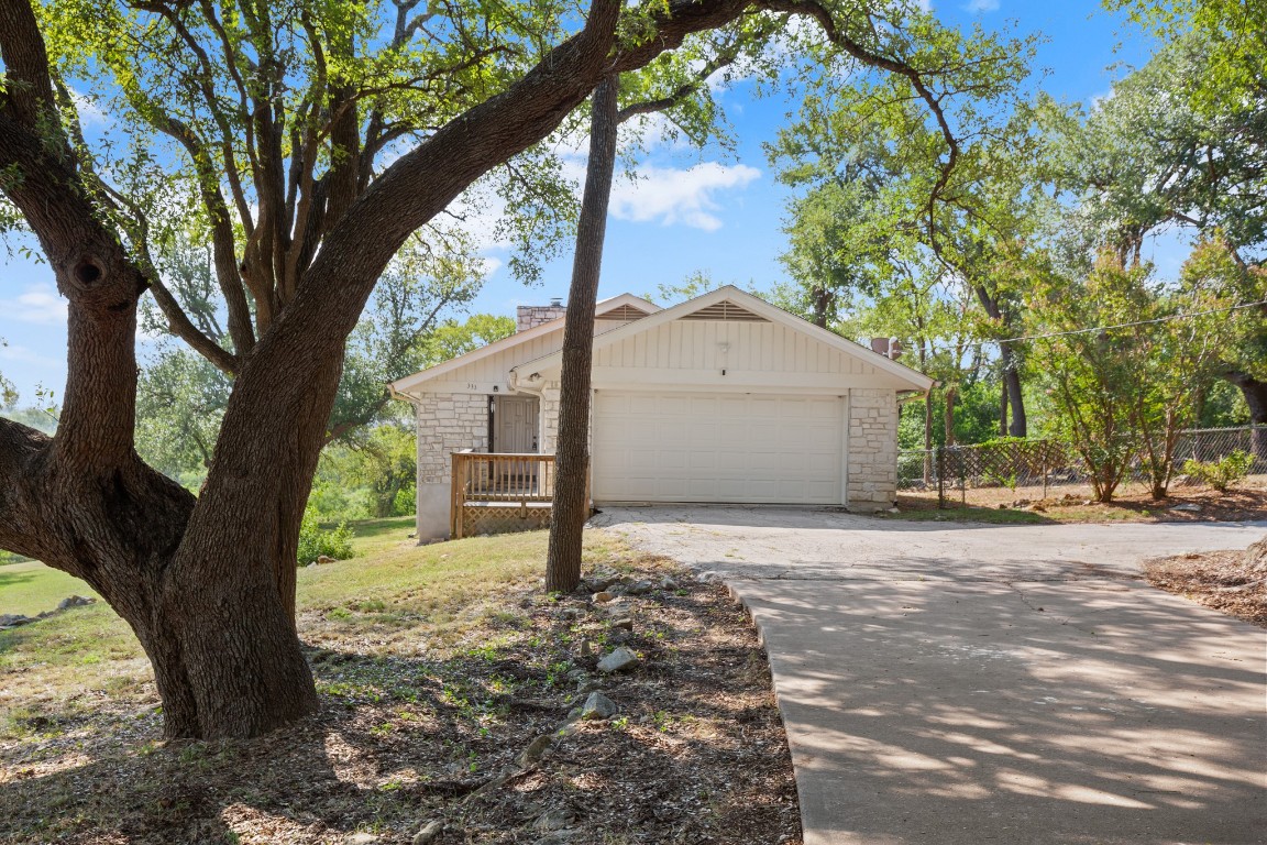 333 County Road 166 Georgetown, TX 78626 - Photo 5 of 36 a tree in the middle of a house