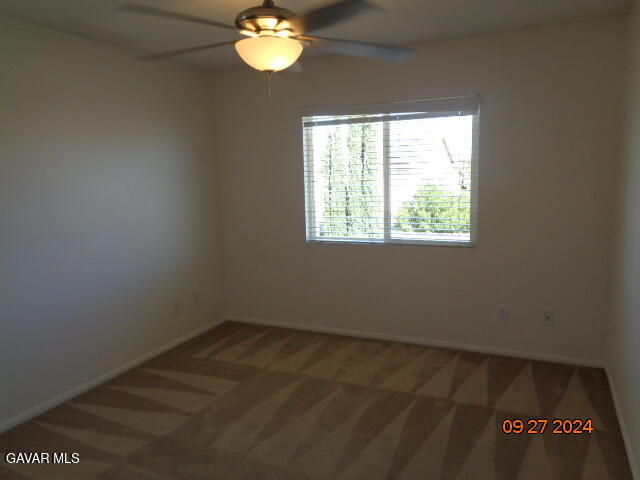 43660 Windrose Place Lancaster, CA 93536 - Photo 16 of 26 an empty room with a window