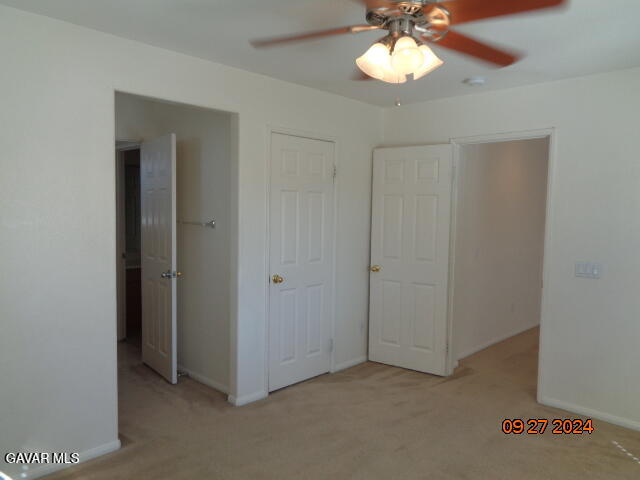 43660 Windrose Place Lancaster, CA 93536 - Photo 22 of 26 a view of an empty room with a window