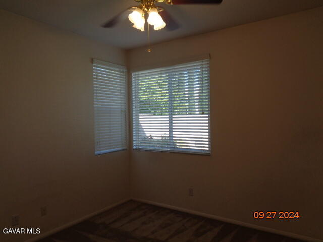 43660 Windrose Place Lancaster, CA 93536 - Photo 9 of 26 a view of an empty room with a window