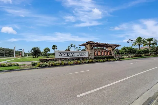 a view of a city street with a building and a street