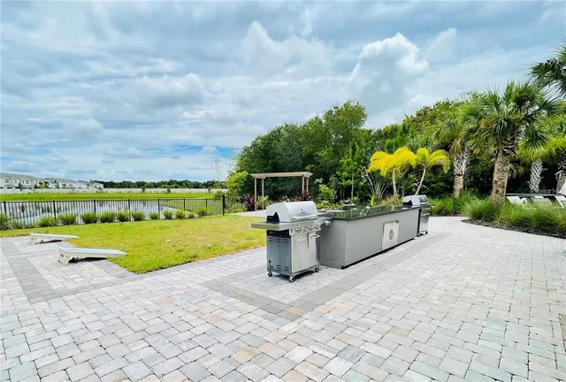 a view of a house with a big yard
