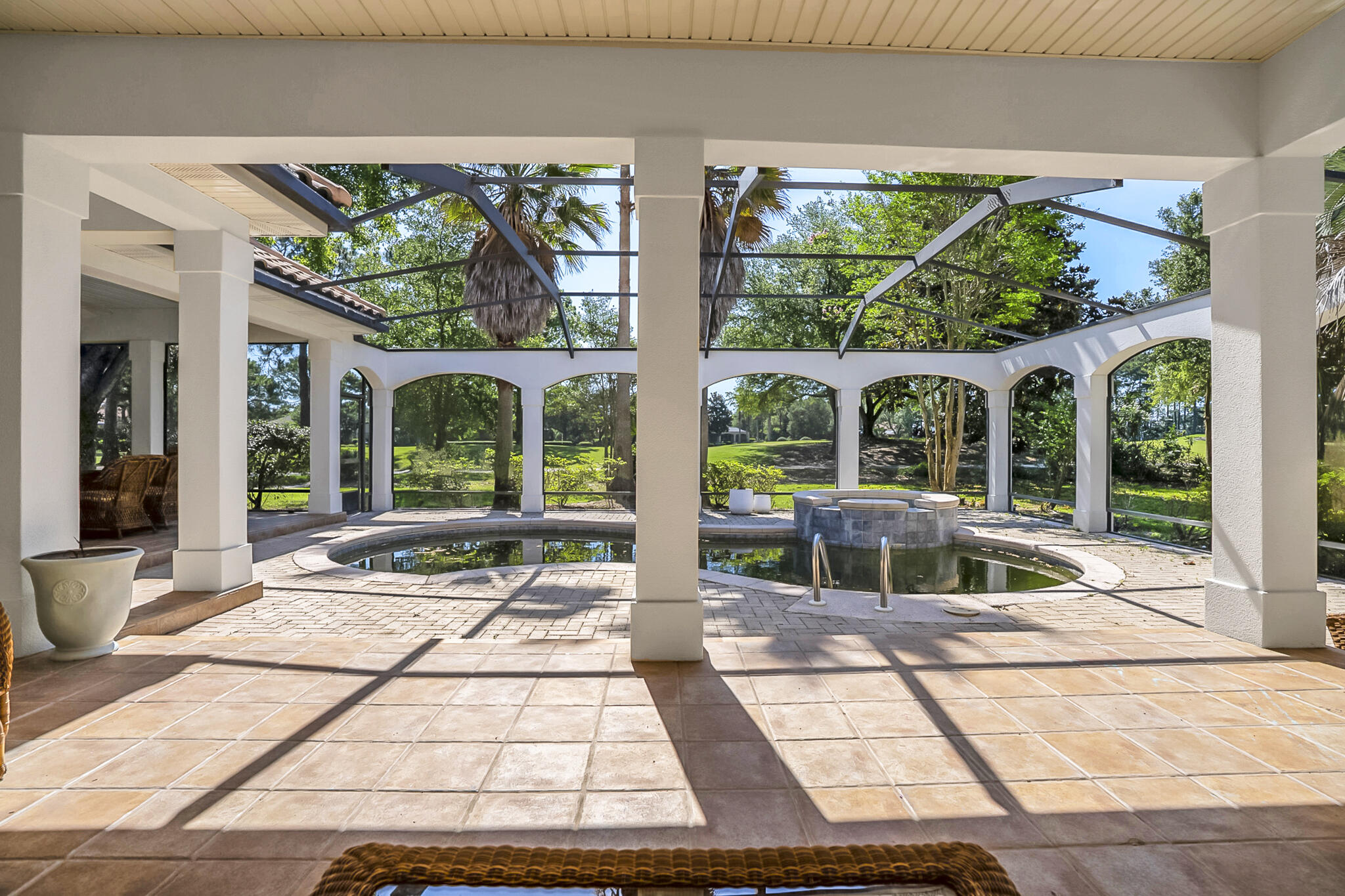 4372 Stonebridge Road Destin, FL 32541 - Photo 51 of 83 a view of a house with porch and garden