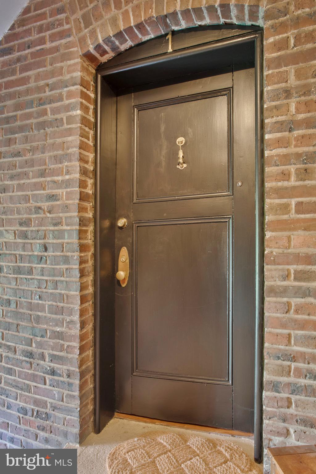 3024 North Calvert Street, Unit A1 Baltimore, MD 21218 - Photo 2 of 41 Notice the historic door knocker!