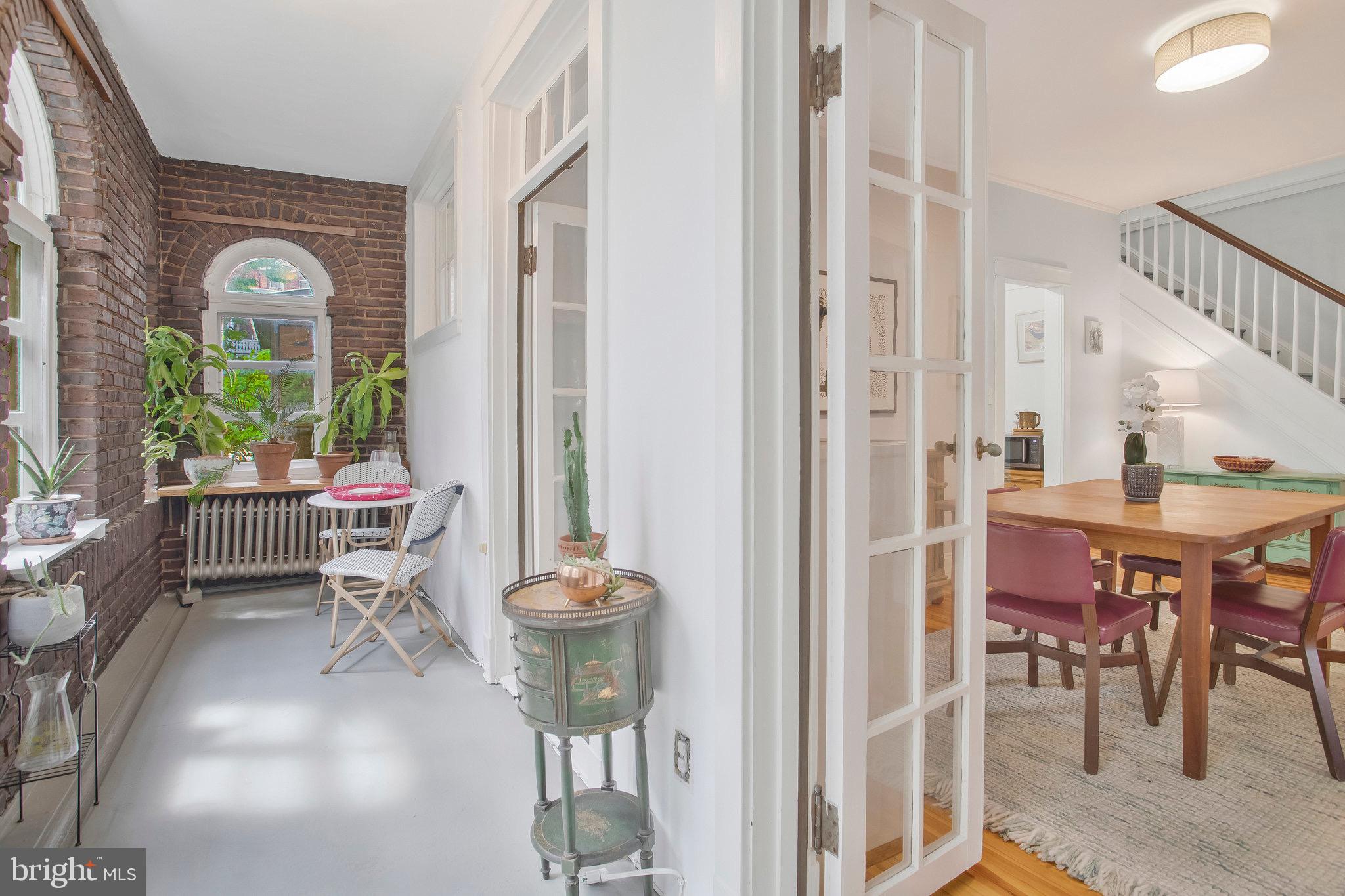 3024 North Calvert Street, Unit A1 Baltimore, MD 21218 - Photo 8 of 41 Enclosed porch is accessible from LR and DR.