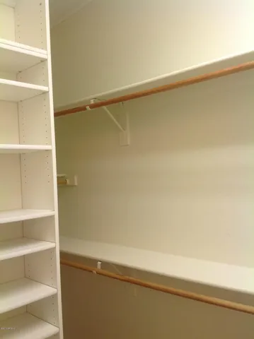 a bathroom with a glass door shower