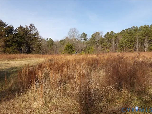 a view of lake with green space
