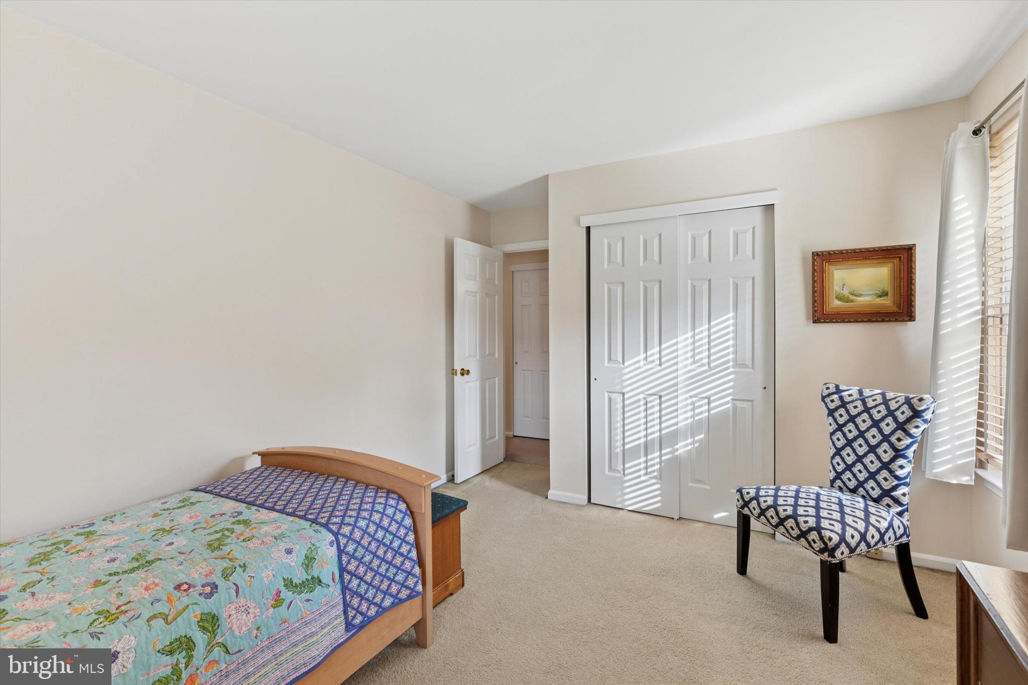 2300 Navajo Path Ambler, PA 19002 - Photo 19 of 25 a bedroom with a bed and chair
