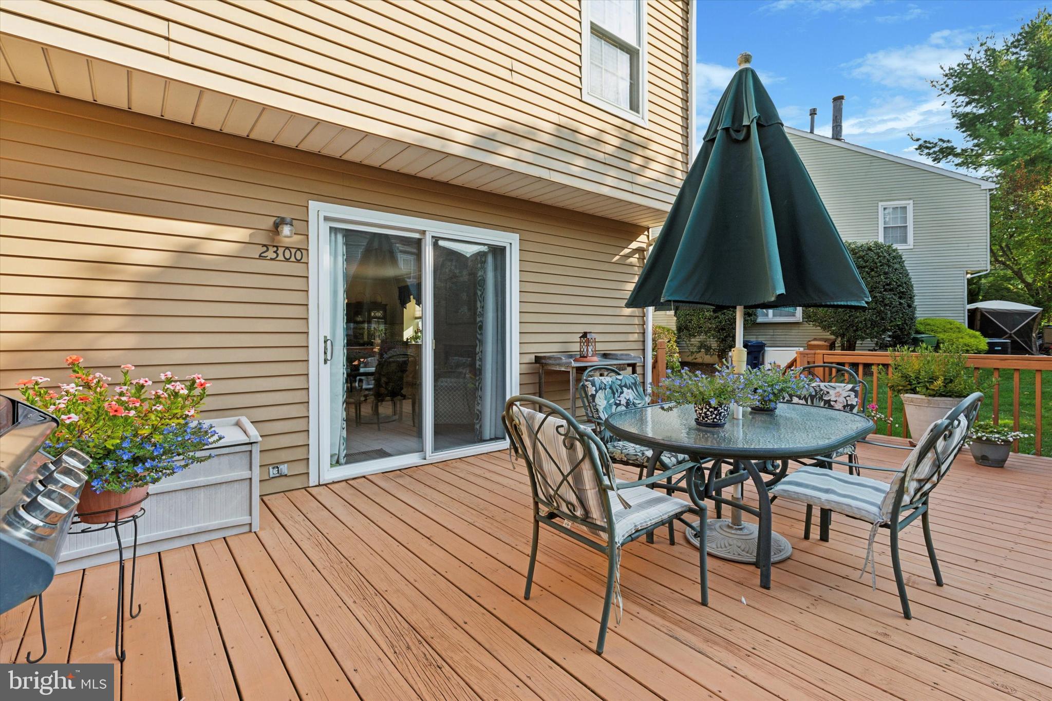 2300 Navajo Path Ambler, PA 19002 - Photo 23 of 25 a view of a house with backyard and sitting area