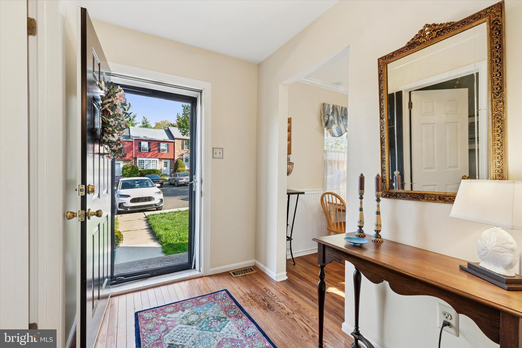 2300 Navajo Path Ambler, PA 19002 - Photo 3 of 25 a view of a hallway with a couch and a potted plant