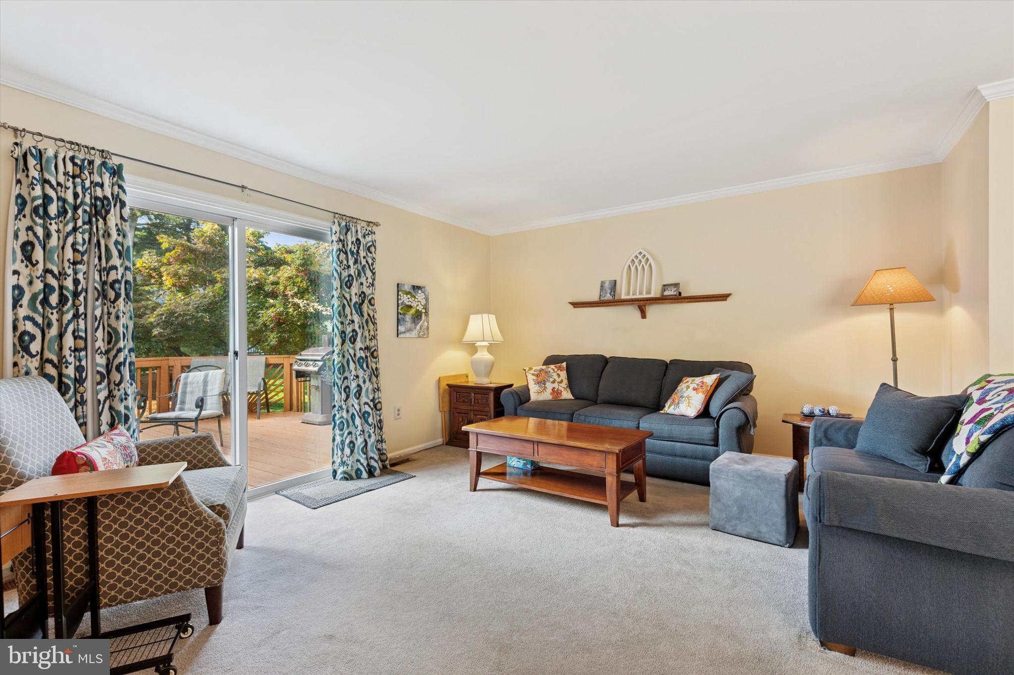 2300 Navajo Path Ambler, PA 19002 - Photo 8 of 25 a living room with furniture and a floor to ceiling window