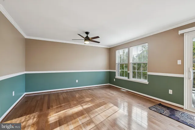 a view of a living room kitchen and a window