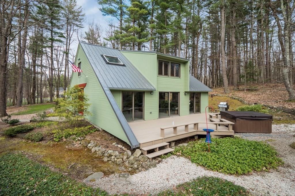 25 Hog Hill Road Pepperell, MA 01463 - Photo 32 of 34 a view of a house with a yard