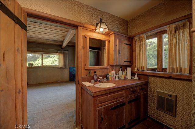 a view of a house with a yard and plants