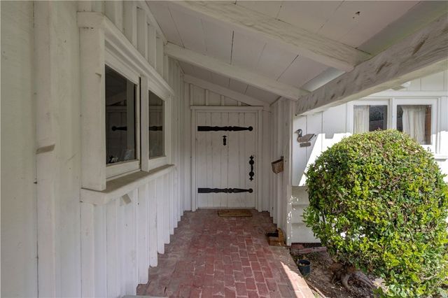 a view of a porch with chairs