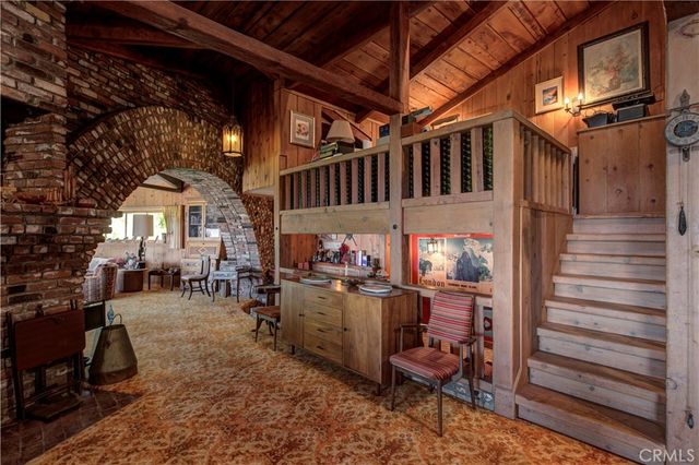 a view of a chairs and table in a room