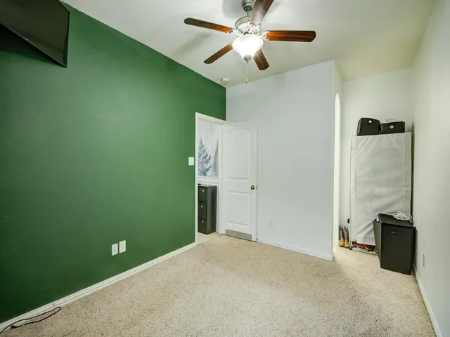 a en suite bathroom with a sink and a mirror