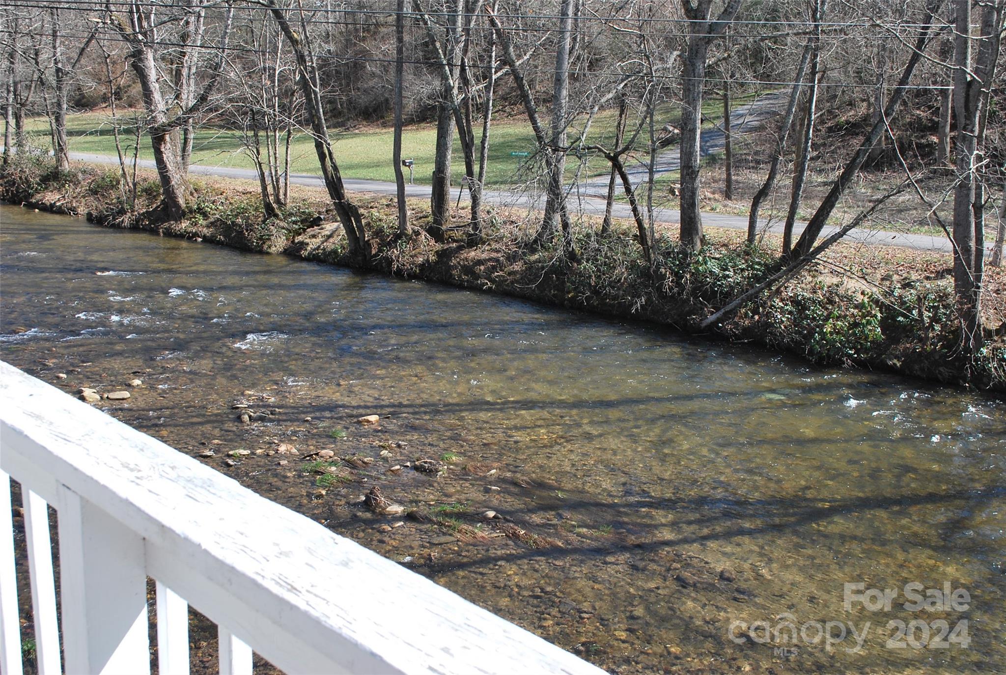 466 Mundy Field Road Canton, NC 28716 - Photo 3 of 20 a view of a wooden fence next to a yard