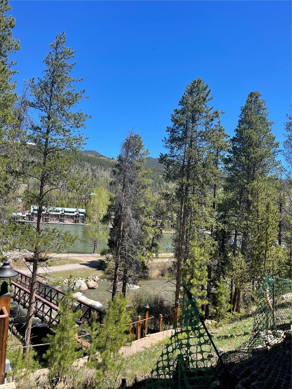 125 Lake Ridge Circle, Unit 1866 Keystone, CO 80435 - Photo 21 of 43 a view of a lake with a city view