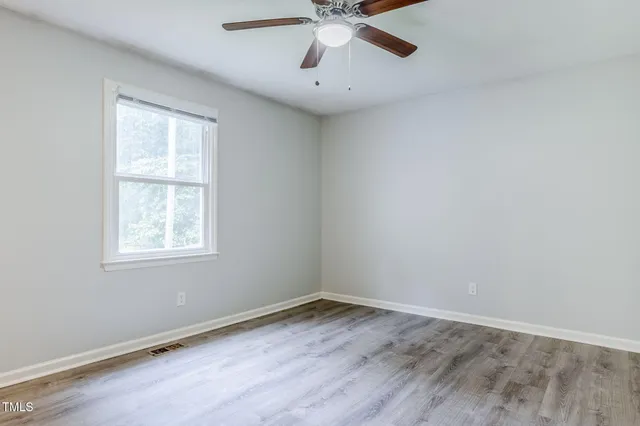 a view of a kitchen with a sink dishwasher and a microwave oven