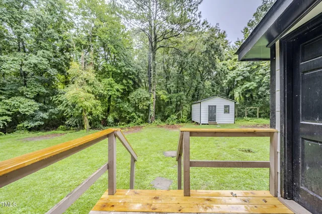 a bedroom with bed and window