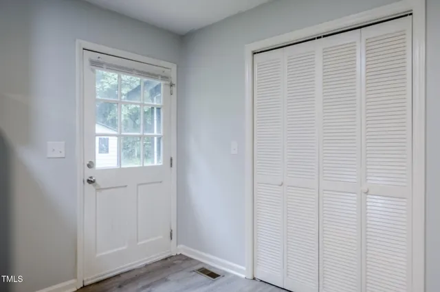 a kitchen with a sink stove and refrigerator