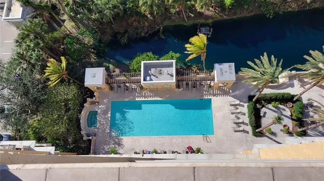 a room that has a flower pot and a potted plant