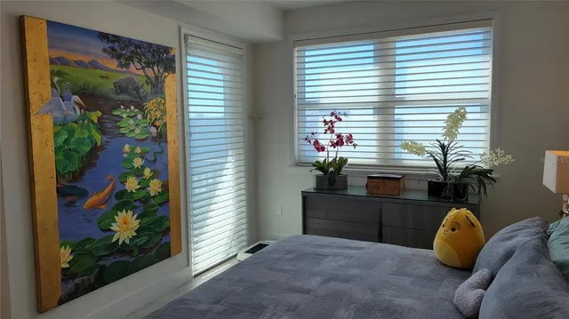 a bathroom with a toilet and a bathtub