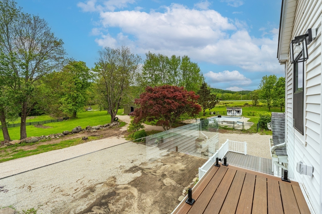 6 Hitching Post Lane Wilbraham, MA 01095 - Photo 21 of 34 a view of a backyard with sitting area