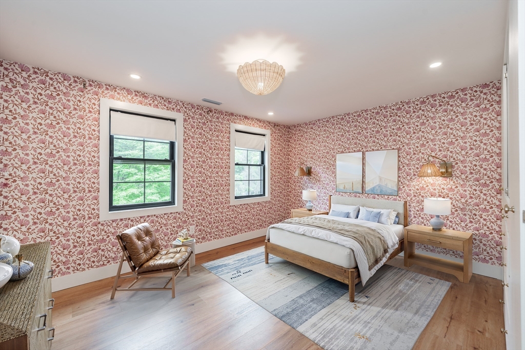 6 Hitching Post Lane Wilbraham, MA 01095 - Photo 25 of 34 a bedroom with a bed and a chair