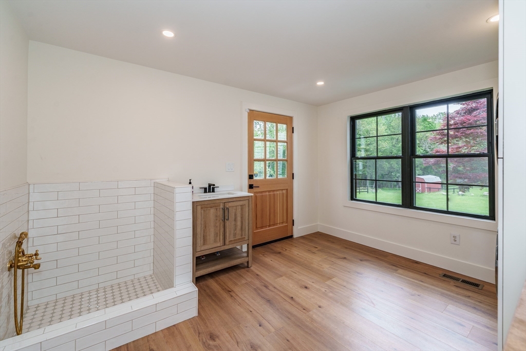 6 Hitching Post Lane Wilbraham, MA 01095 - Photo 31 of 34 a view of livingroom with furniture and wooden floor