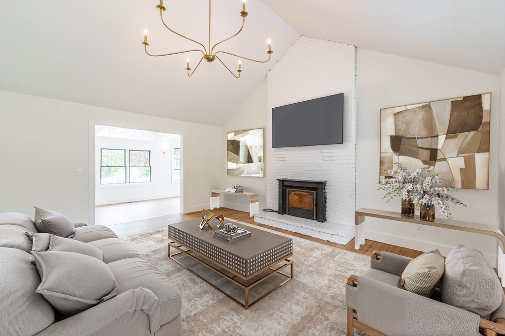 6 Hitching Post Lane Wilbraham, MA 01095 - Photo 5 of 34 a living room with furniture and a fireplace