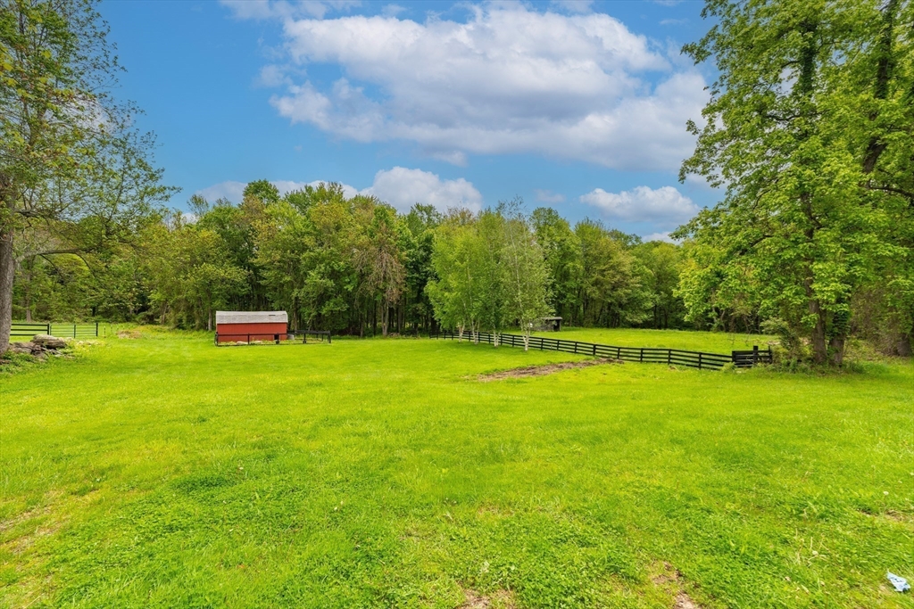 6 Hitching Post Lane Wilbraham, MA 01095 - Photo 9 of 34 a view of a swimming pool with a yard