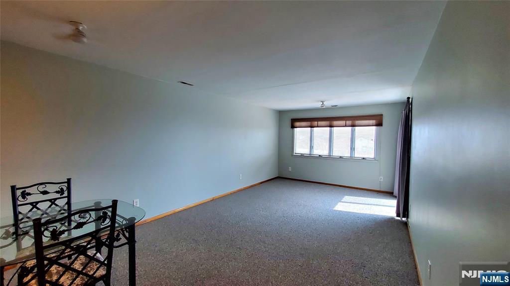 1159 Radio Road, Unit 7 Little Egg Harbor, NJ 08087 - Photo 11 of 38 a view of a livingroom with a window