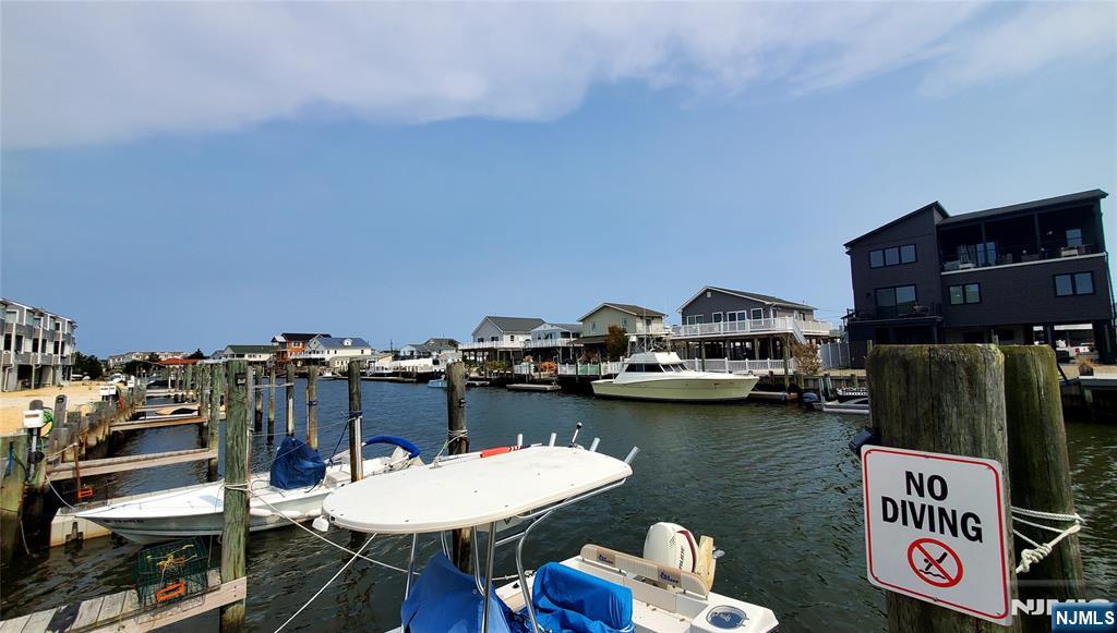 1159 Radio Road, Unit 7 Little Egg Harbor, NJ 08087 - Photo 24 of 38 a view of a lake with sitting area