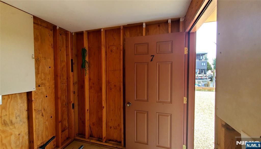 1159 Radio Road, Unit 7 Little Egg Harbor, NJ 08087 - Photo 28 of 38 a view of a door with wooden floor
