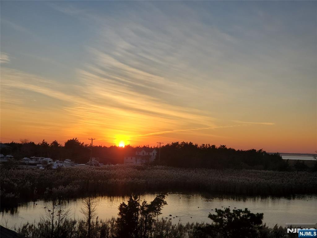 1159 Radio Road, Unit 7 Little Egg Harbor, NJ 08087 - Photo 30 of 38 a view of sunset