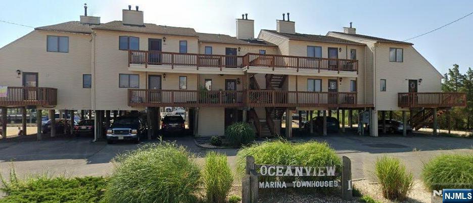 1159 Radio Road, Unit 7 Little Egg Harbor, NJ 08087 - Photo 38 of 38 a front view of a building with garden