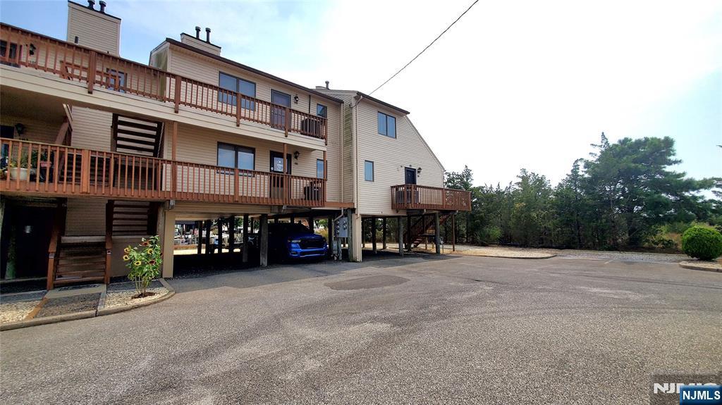 1159 Radio Road, Unit 7 Little Egg Harbor, NJ 08087 - Photo 5 of 38 a view of a building with a street